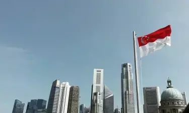 Singapore urges migrant workers to report kickbacks following major case