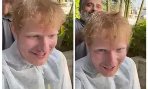 Ed Sheeran enjoys the desi hospitality with a relaxing head champi Ed Sheeran enjoys the desi hospitality with a relaxing head champi