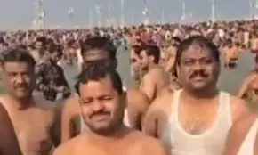 Karnataka contractors take holy dip at Sangam, pray for clearance of pending bills