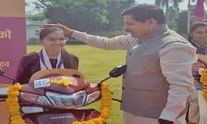 Madhya Pradesh CM distributes e-scooties to meritorious students (Ld)