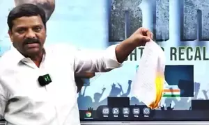 Show-cause notice to Telangana Congress MLC for burning caste census report