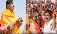 MP CM Mohan Yadav takes holy dip at Triveni Sangam