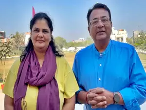 Cricket Australias cultural ambassador, wife take dip at Sangam to celebrate 25th wedding anniversary