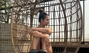 Malaika Arora starts her day with yoga, sunshine and her furry friend