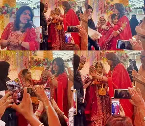 Raveena Tandon gifts gold bangles to bride during a mass wedding ceremony