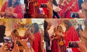 Raveena Tandon gifts gold bangles to bride during a mass wedding ceremony Raveena Tandon gifts gold bangles to bride during a mass wedding ceremony