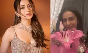 Rakul flaunts happy face as husband Jackky Bhagnani brings flowers