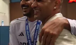 Shikhar Dhawan hands Fielder of the Match medal to Axar for electric direct hit vs Pak Shikhar Dhawan hands Fielder of the Match medal to Axar for electric direct hit vs Pak
