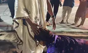Mouni Roy experiences a moment of awakening as she touches the feet of Sadhguru