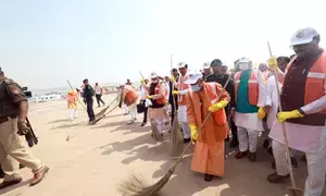 CM Yogi launches cleanliness drive at Sangam after Maha Kumbh culmination
