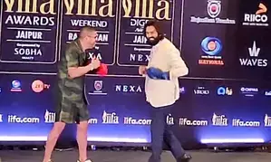 Kartik Aaryan goes up against world-famous boxer Anthony Pettis during IIFA 2025