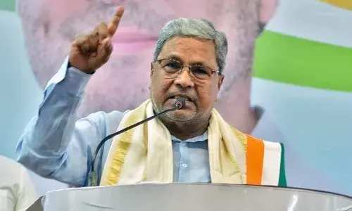 Siddaramaiah Under Fire for Honouring Tainted IPS Officer Amid Cong Opposition to Waqf Revision