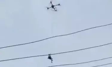 Man trapped on roof rescued by drone as floods engulf streets in Southern China