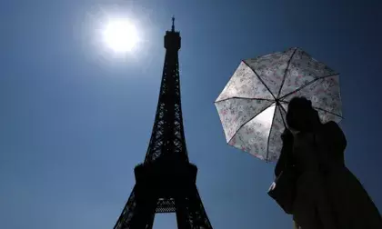 Europe’s heatwave disrupts train services and forces closure of Eiffel Tower’s top in Paris