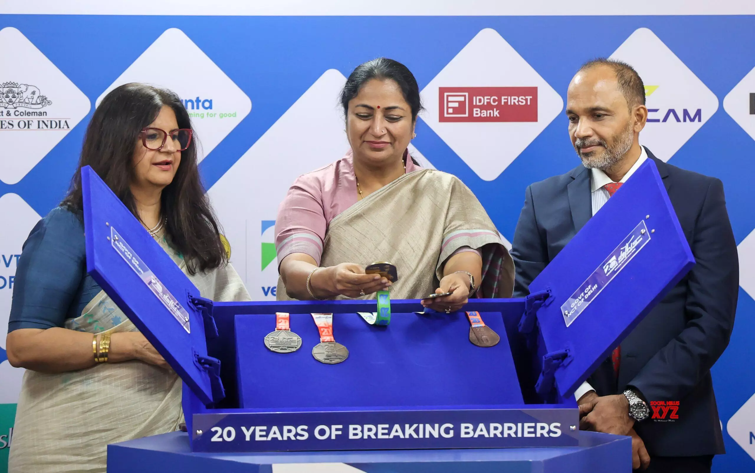 Delhi CM Rekha Gupta unveils Finisher’s Medal for Vedanta Delhi Half Marathon 2025