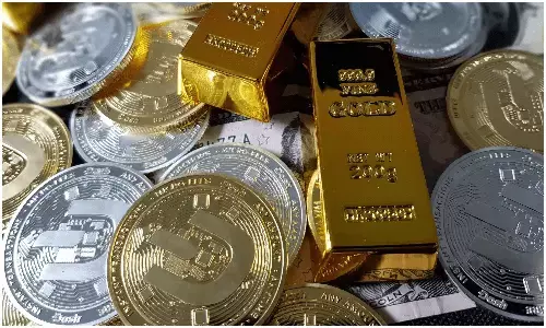 Gold, Silver Slide Sharply After Record Highs as Heavy Profit-Booking Hits Bullion Market