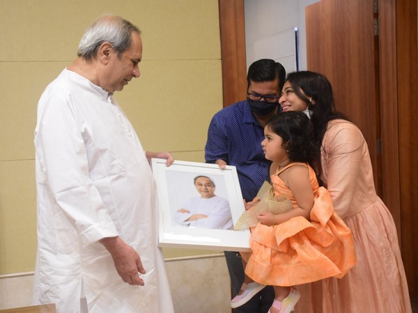 Wonder Kid Anvi presents Odisha CM with one of her 72 paintings