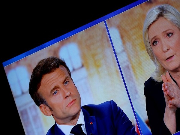 Frances Macron accuses rival Le Pen of being dependent on Russia