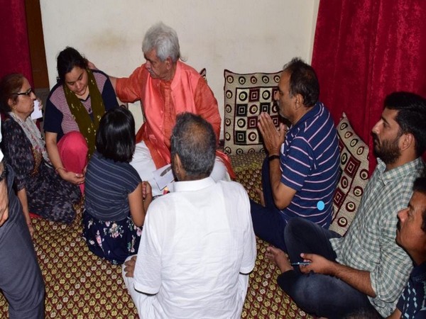 J-K: LG Manoj Sinha visits Rahul Bhats residence, meets family