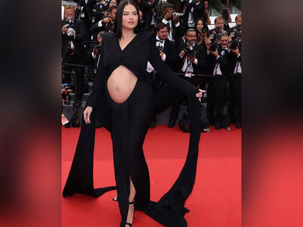 Brazilian model Adriana Lima flaunts baby bump at Top Gun: Maverick Cannes premiere