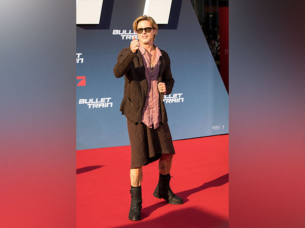 Brad Pitt reacts to his viral skirt look from Bullet Train premiere