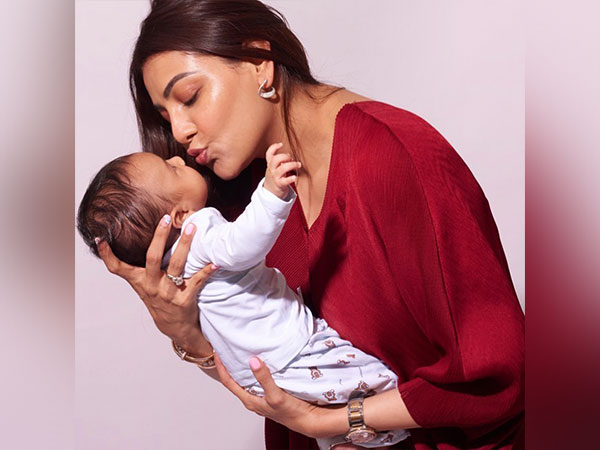 Kajal Aggarwal with her son Neil dedicates Baahubali scene to SS Rajamouli